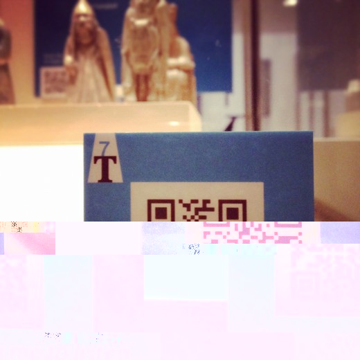 26 Treasures: photo showing QR Code in use in gallery