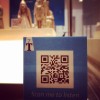 26 Treasures: photo showing QR Code in use in gallery
